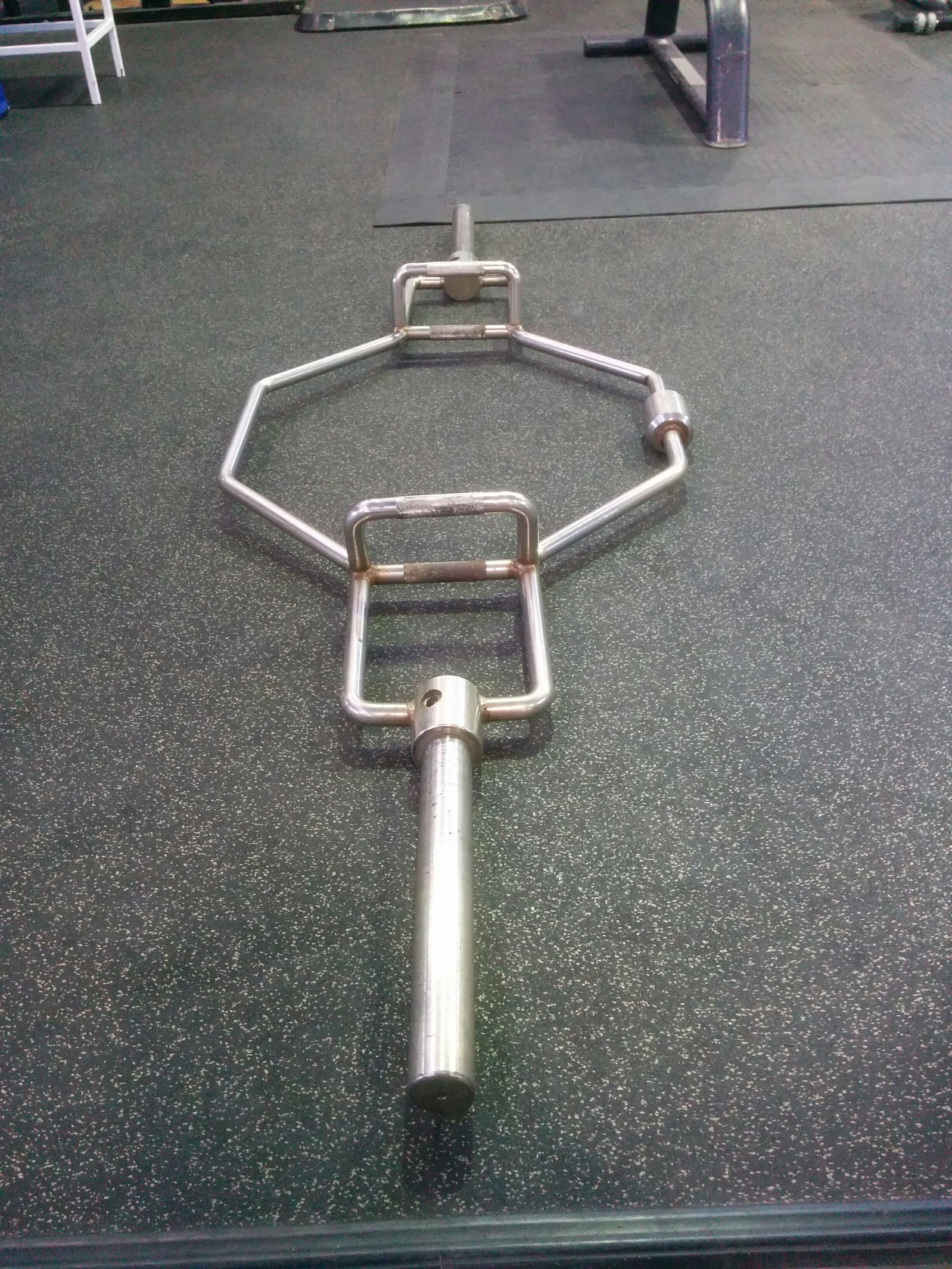 Hex-shaped trap bar on the gym floor